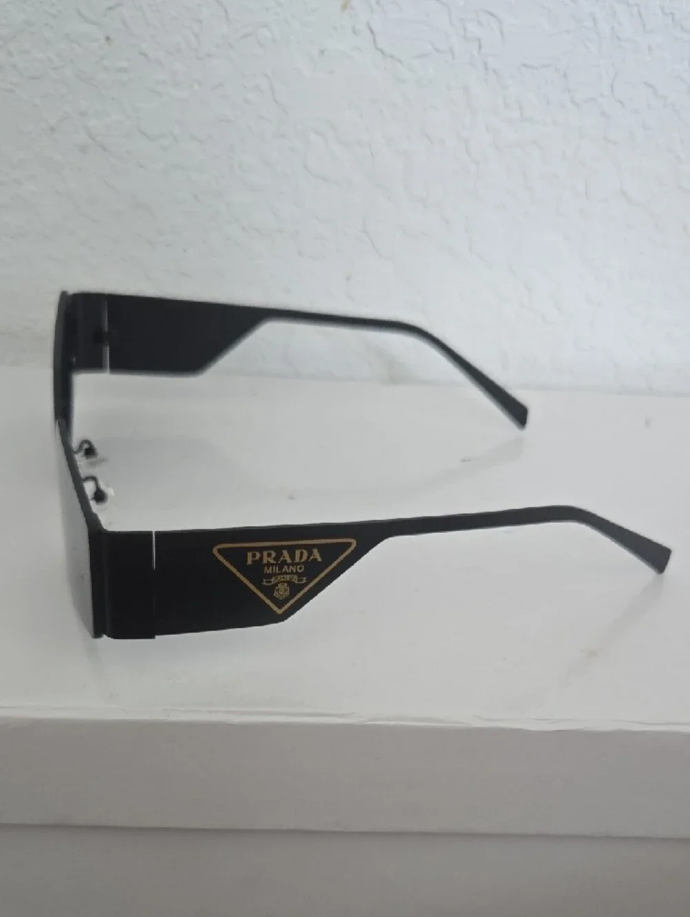 2 Pair Of Sunglasses